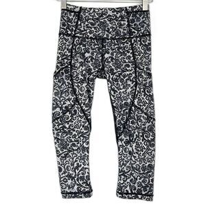 Lululemon Outrun Crop Lace Print Mesh Capri Leggings Pockets Size 2